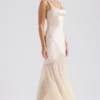 Vittoria champagnekleurige chiffon avondjurk tot op de grond