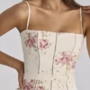Ysabella ivoorkleurige katoenen midi-zomerjurk met vintage rozenprint
